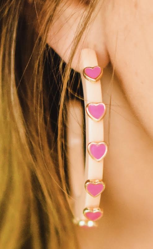 Lifestyle classic and fun valentine's day hoop earrings with heart shaped stones.