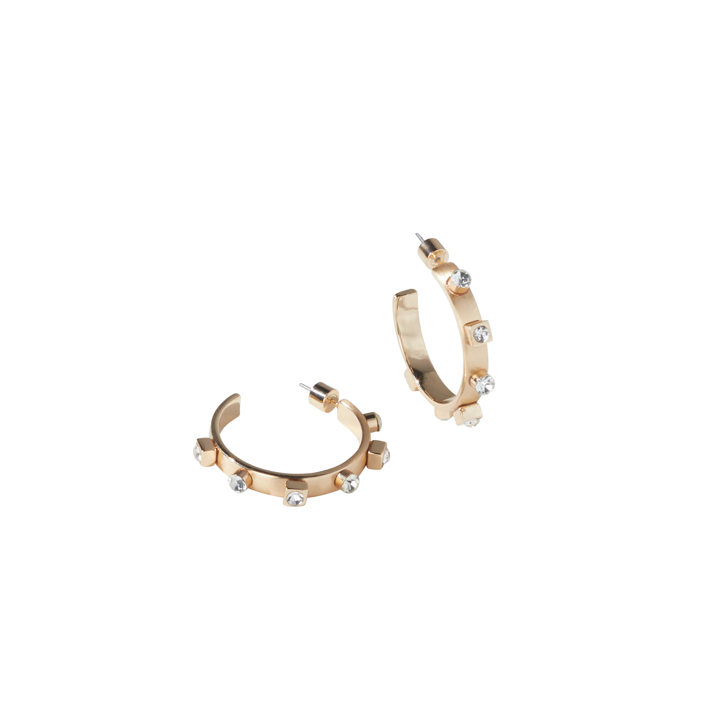 Two brushed gold hoop earrings with crystal gemstones are positioned on a white background, with one earring lying flat and the other standing upright.