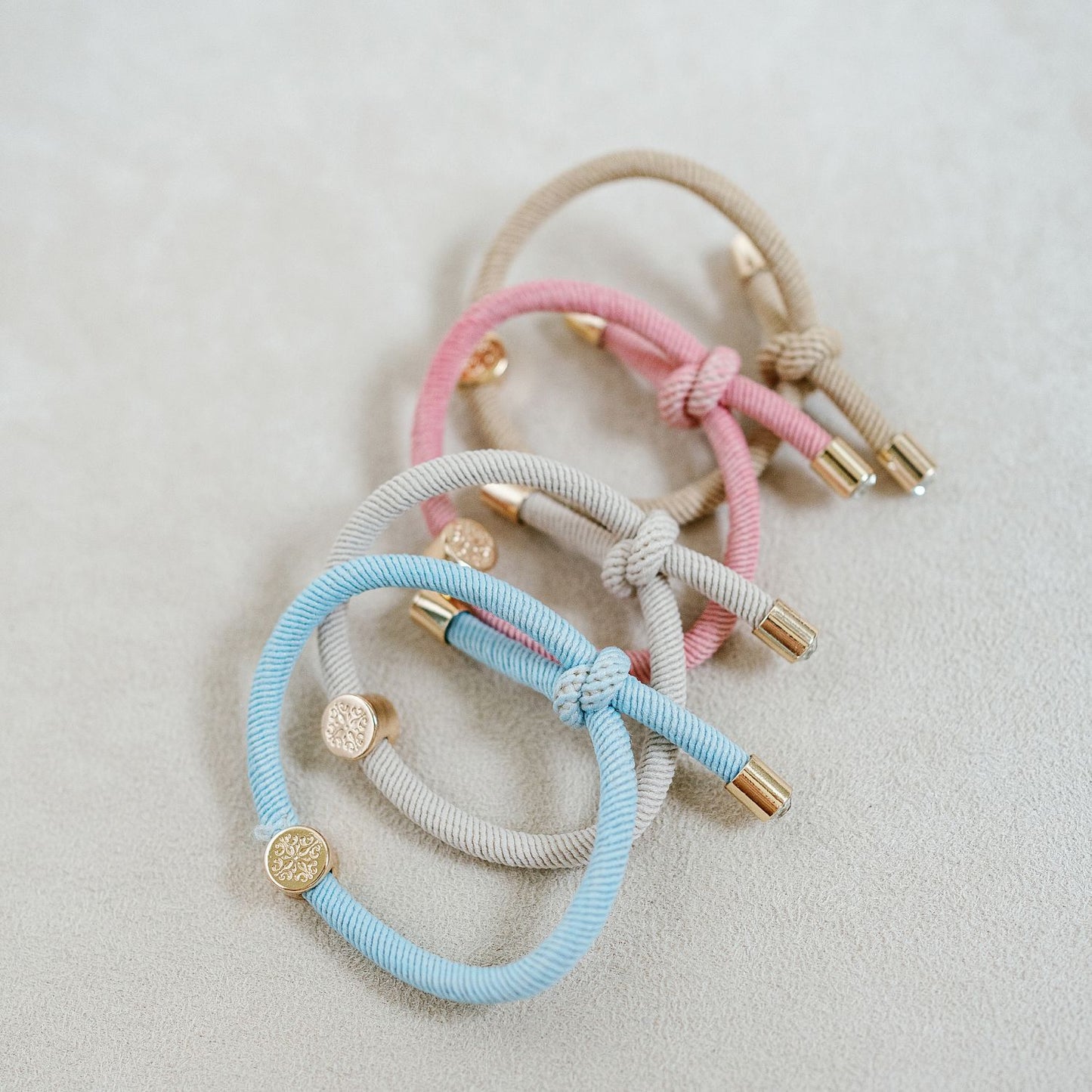 knotted bracelet hair tie set light pink, light blue, baby, tan, cream, gender, oh baby color