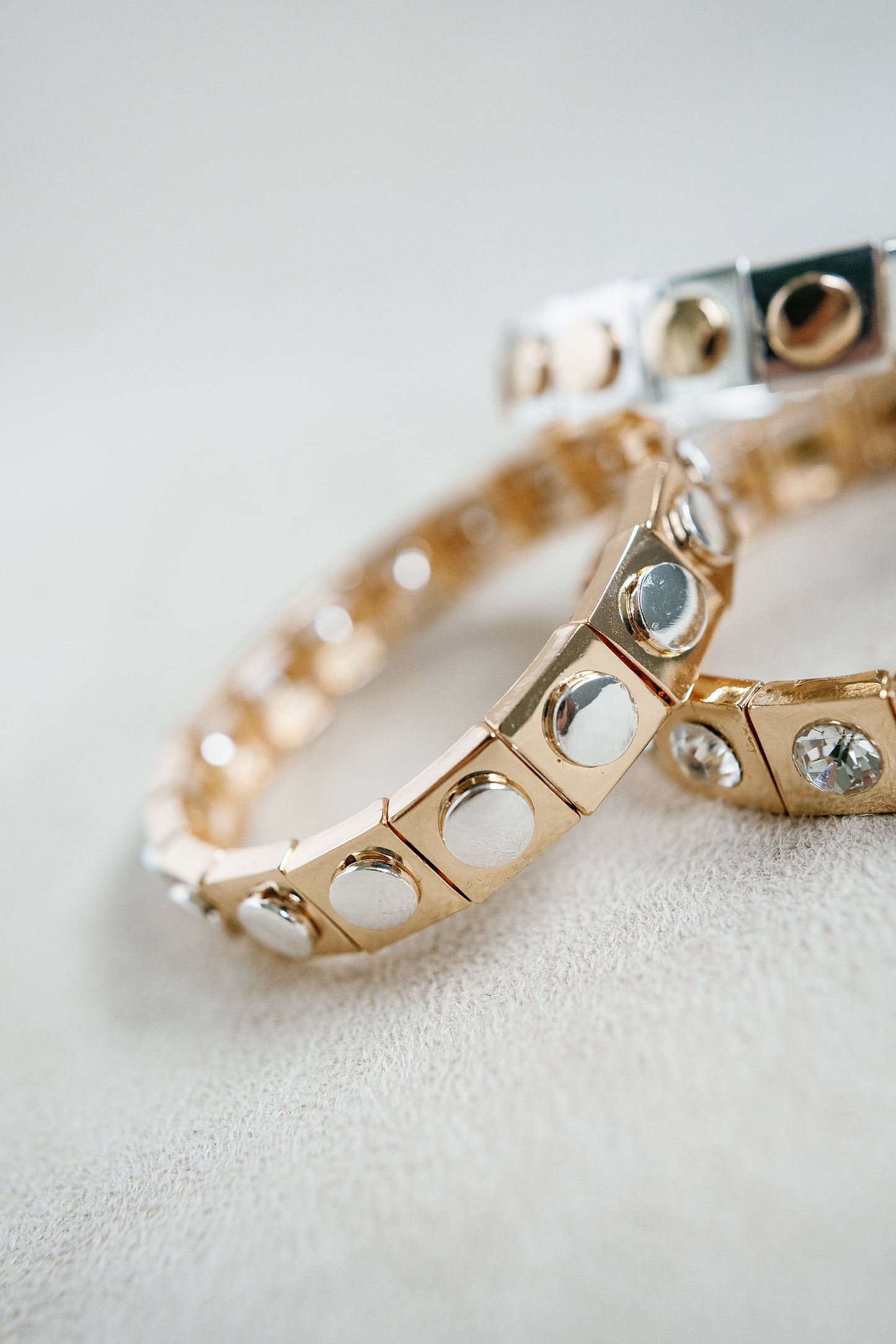mixed metal stretch bracelet with gold and silver for a timeless classy look.