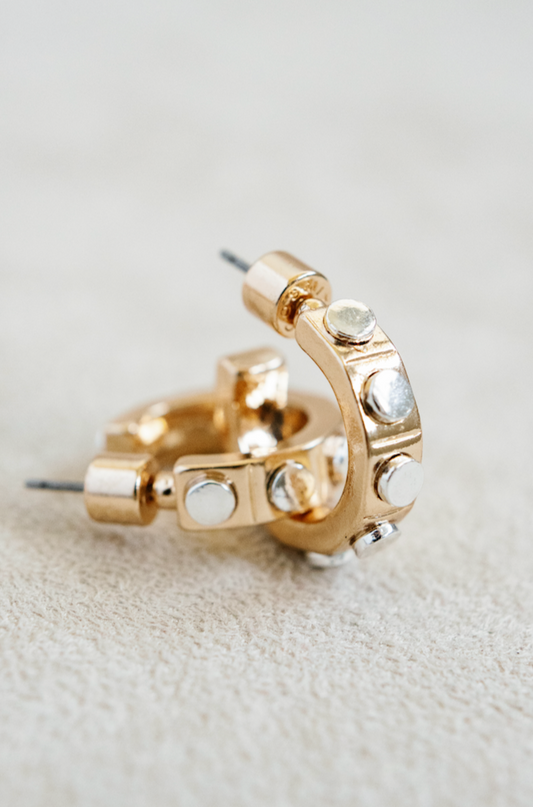 small .5" gold hoop earing with round silver studs