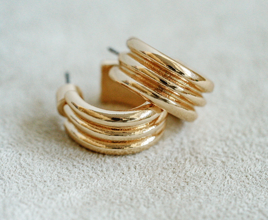 Gold 1 inch mini hoop with triple hoop connecting detail for timeless and classic look.