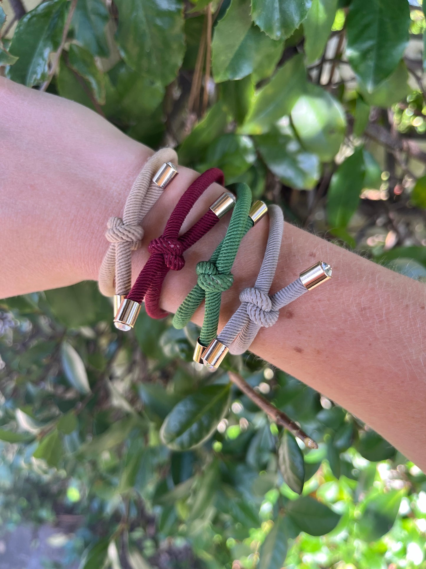 Original knotted hair tie set sold as a set of 4 , tan , cranberry red , green and light grey. Christmas Party 