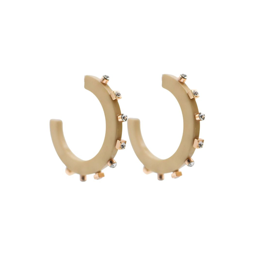 Large matte cream open hoop earrings adorned with gold-tone and crystal rhinestone accents, featuring a lightweight design and clear post backings.