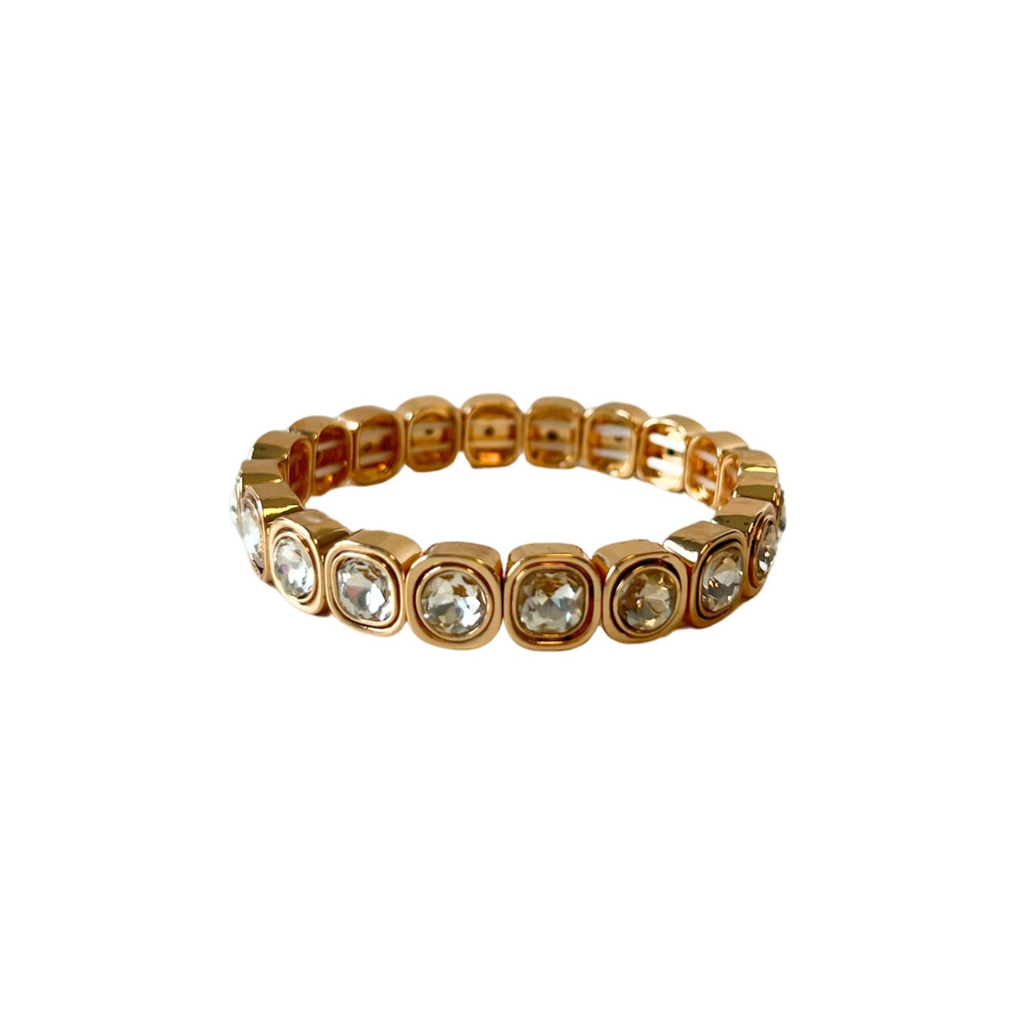 A stretch bracelet with gold-tone square settings, each holding a sparkling round crystal, offering a sleek and luxurious design perfect for layering.