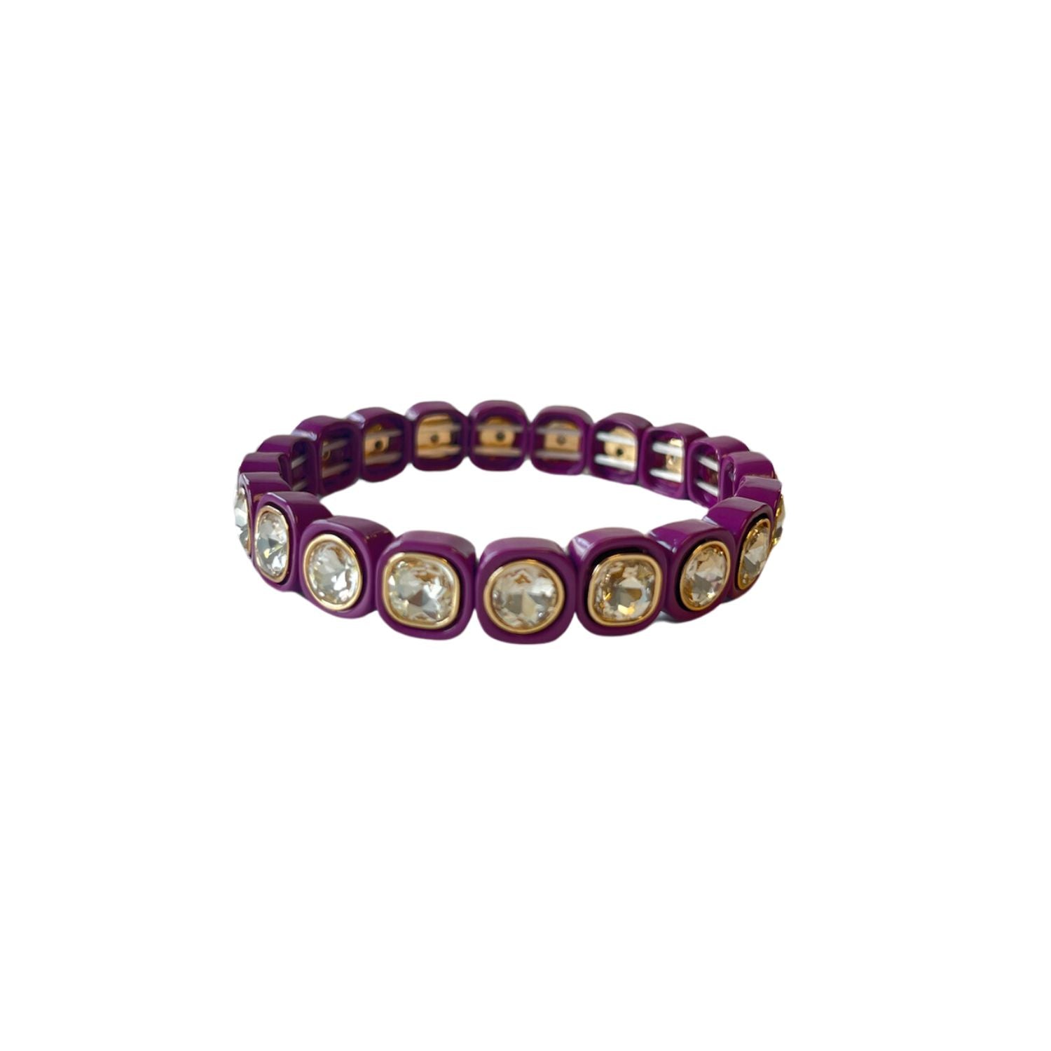 A plum purple stretch bracelet with glossy square links, each featuring a clear, faceted crystal inset in gold trim, arranged evenly around the band.