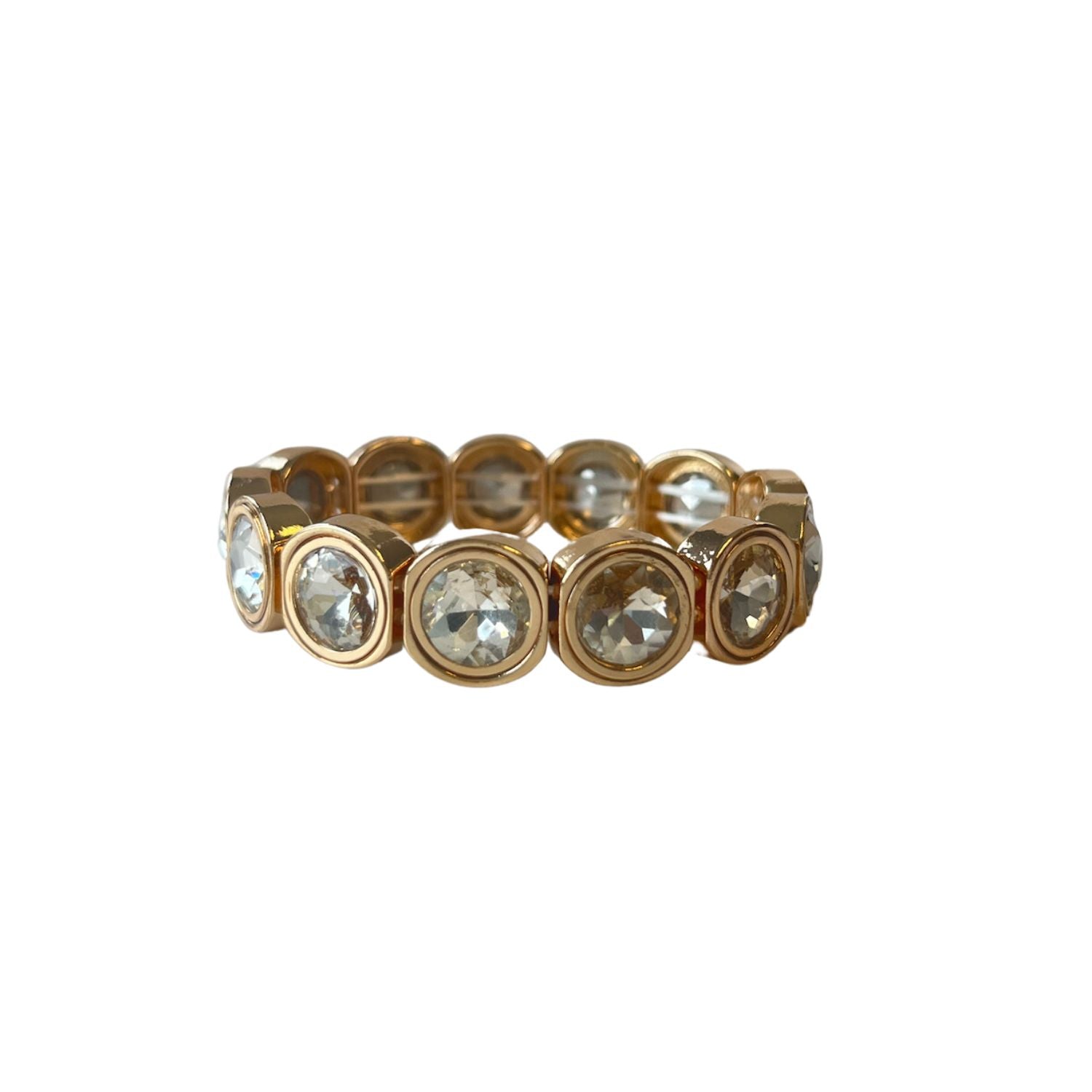 A gold-toned bracelet with circular crystal accents, each housed in rounded square frames, arranged symmetrically around the band for a reflective effect.