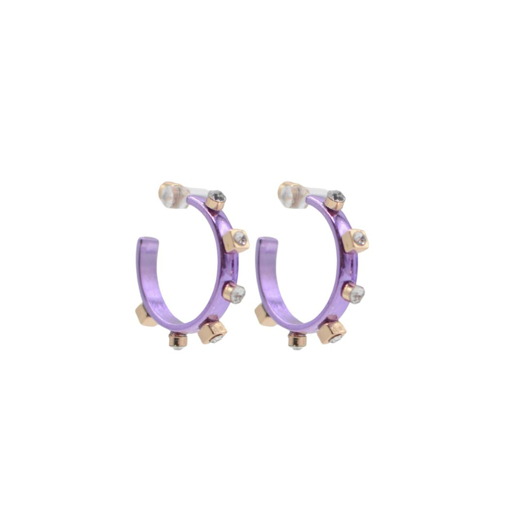 A pair of metallic purple hoop earrings with gold studs and clear jewel accents, set against a white background to highlight their reflective surfaces.