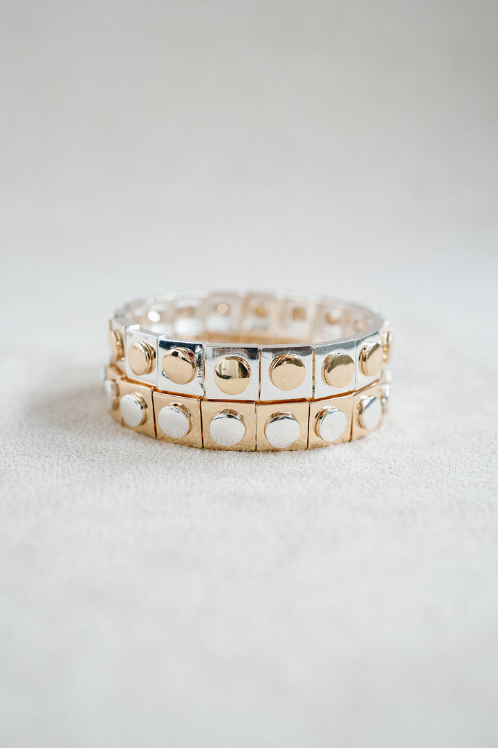Geometric Silver and Gold Mixed Metal Enamel Stretch Bracelet with Contrasting Stud Details. 