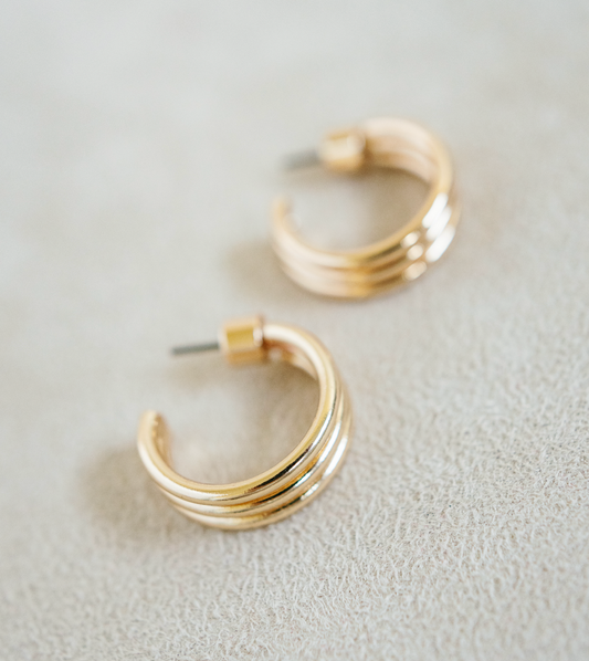 gold triple hoop with rounded connecting detail. 