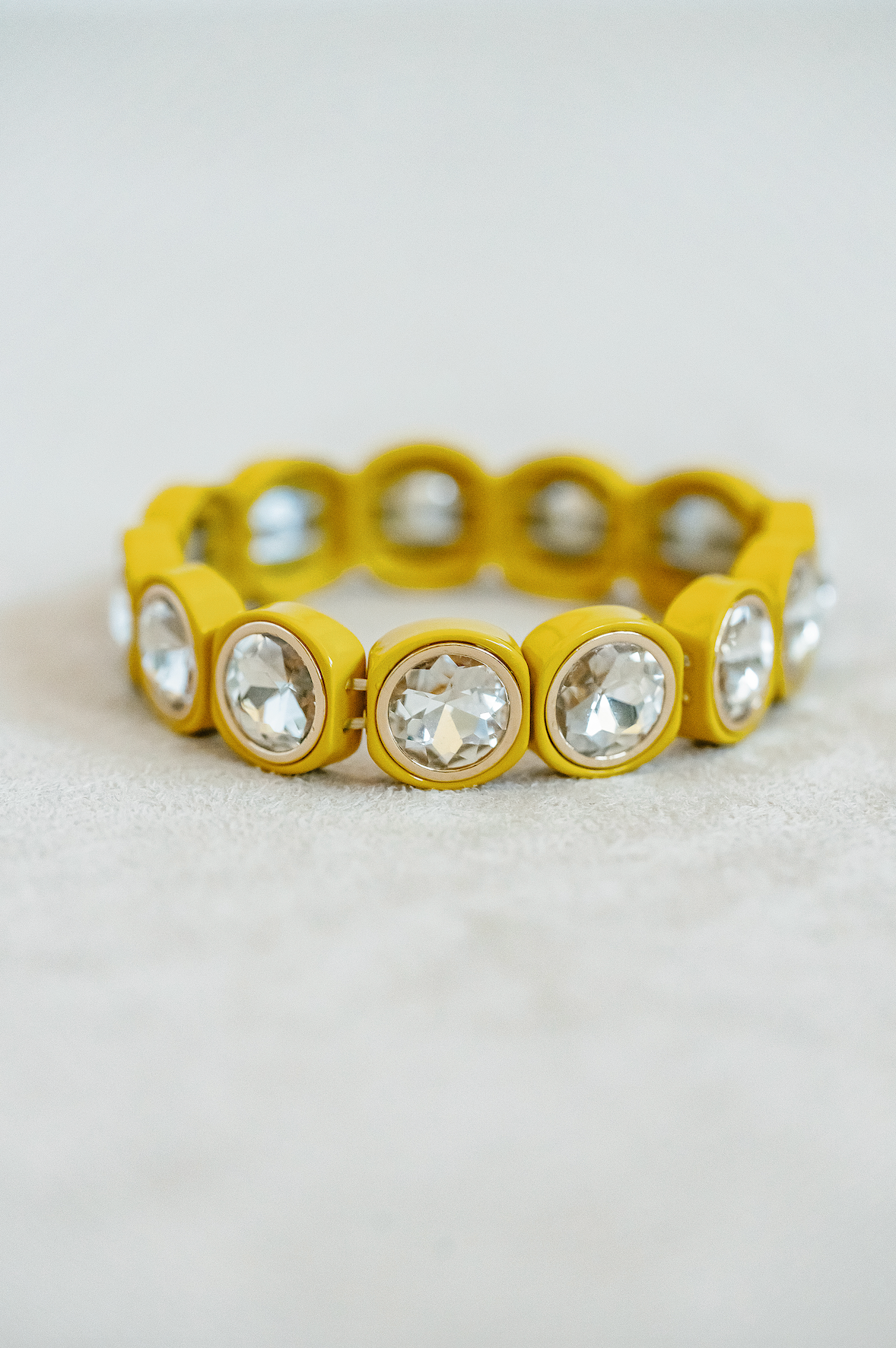 City Girl Round Bracelet in Lemonade. Large round stretch bracelet with crystal stones for classic and fun look.