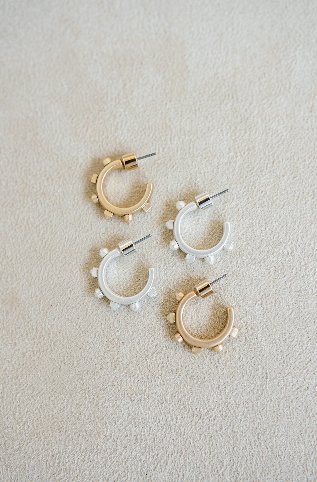 matte silver and matte gold huggie hoops