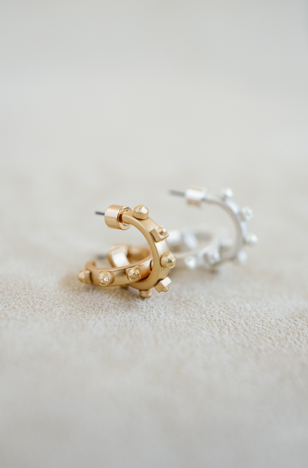 matte gold metal huggie style hoops 