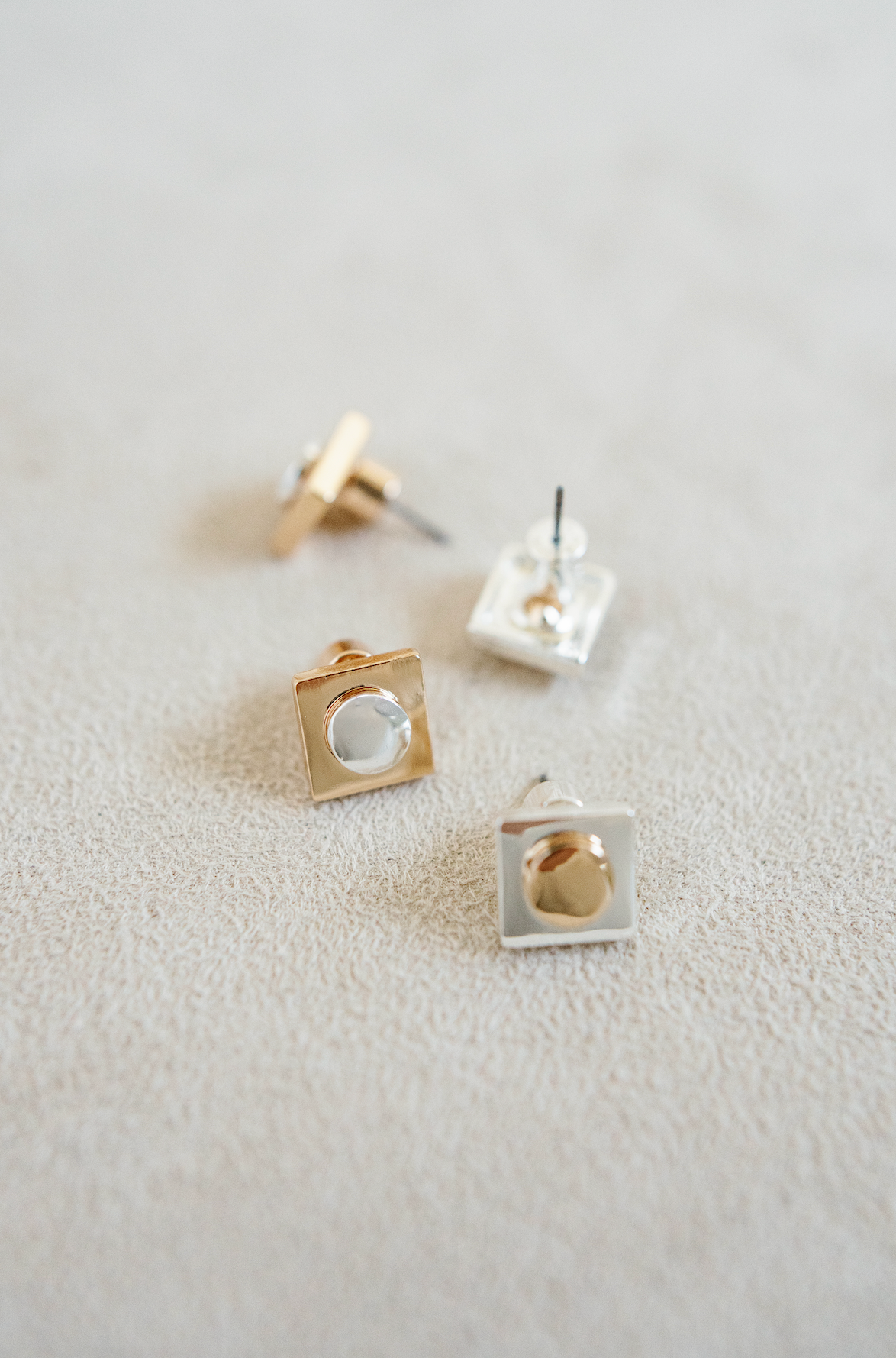 geometric square earring with contrasting mixed metal for elegant and edgy design.