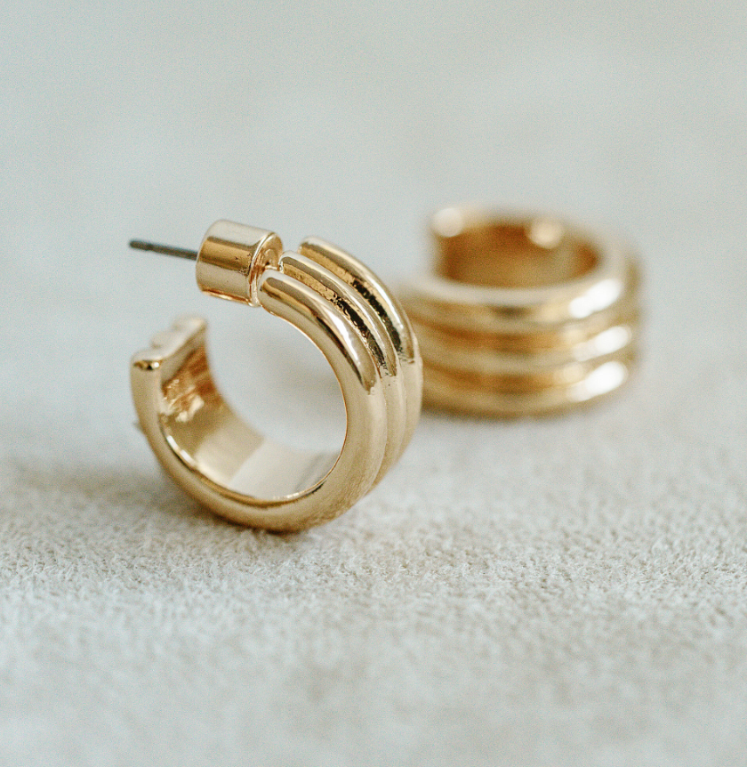Gold 1/2 inch mini hoop with triple hoop connecting detail for timeless and classic look. Easy everyday gold plated hoop earring.