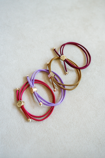 skinny  hair tie set valentine's color combination. Bracelet hair tie set sold as a set of four.