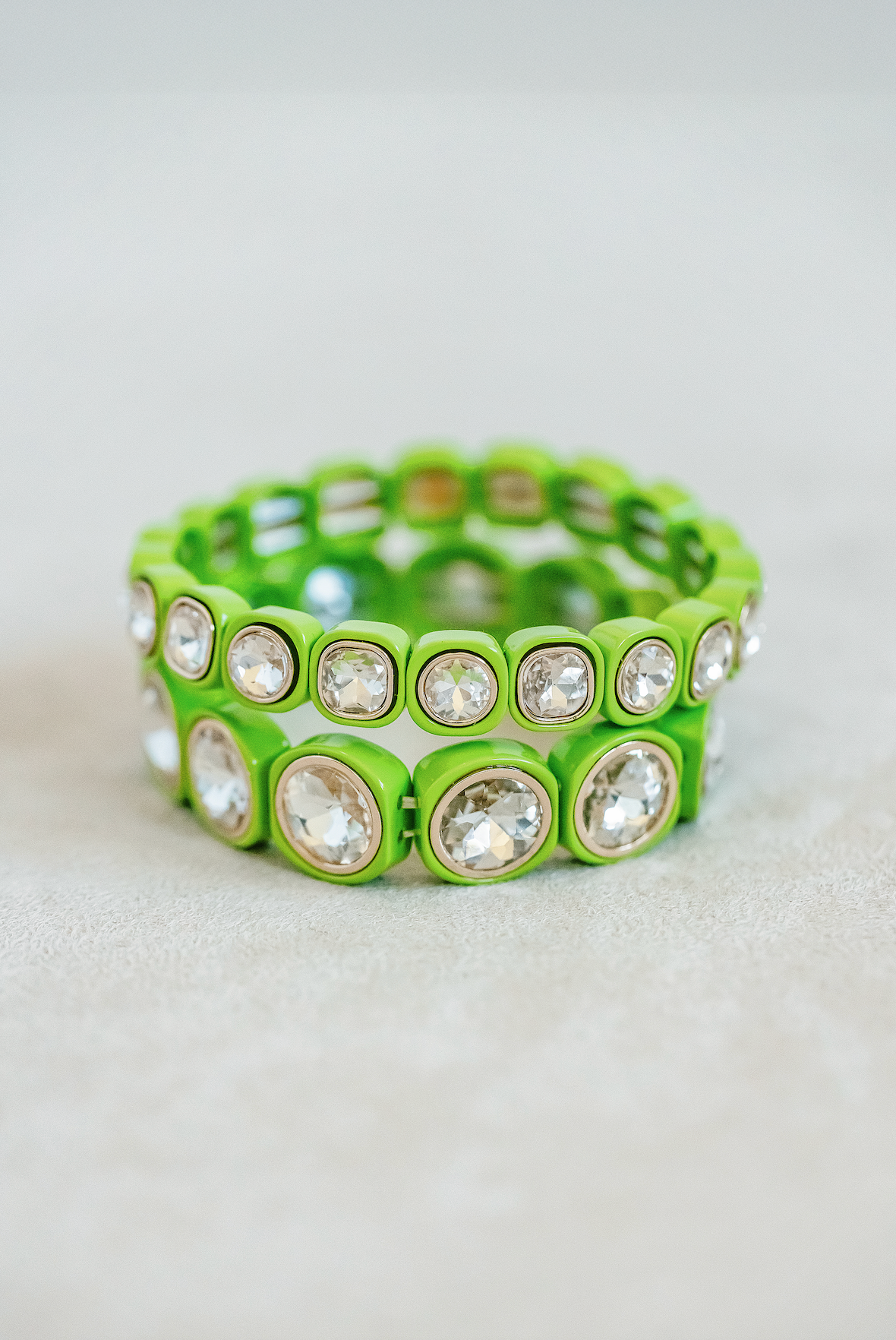 Round and Petite Enamel Stretch Bracelets in Lime Green. Fun pop of color to your bracelet stack.