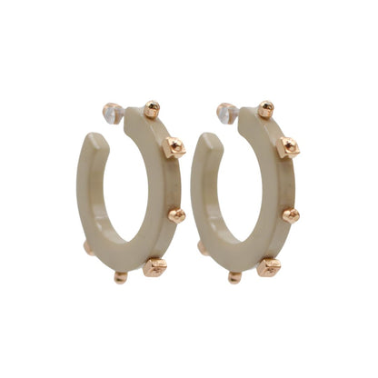 Size small matte beige hoop acrylic earrings with gold-tone studs along the outer edge, featuring an open-back design and clear post backings.