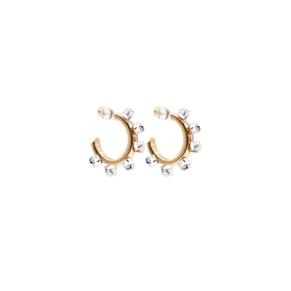 A pair of small, open hoop earrings with a gold-toned finish and silver-tipped studs surrounding the outer edge, displayed against a plain white background.